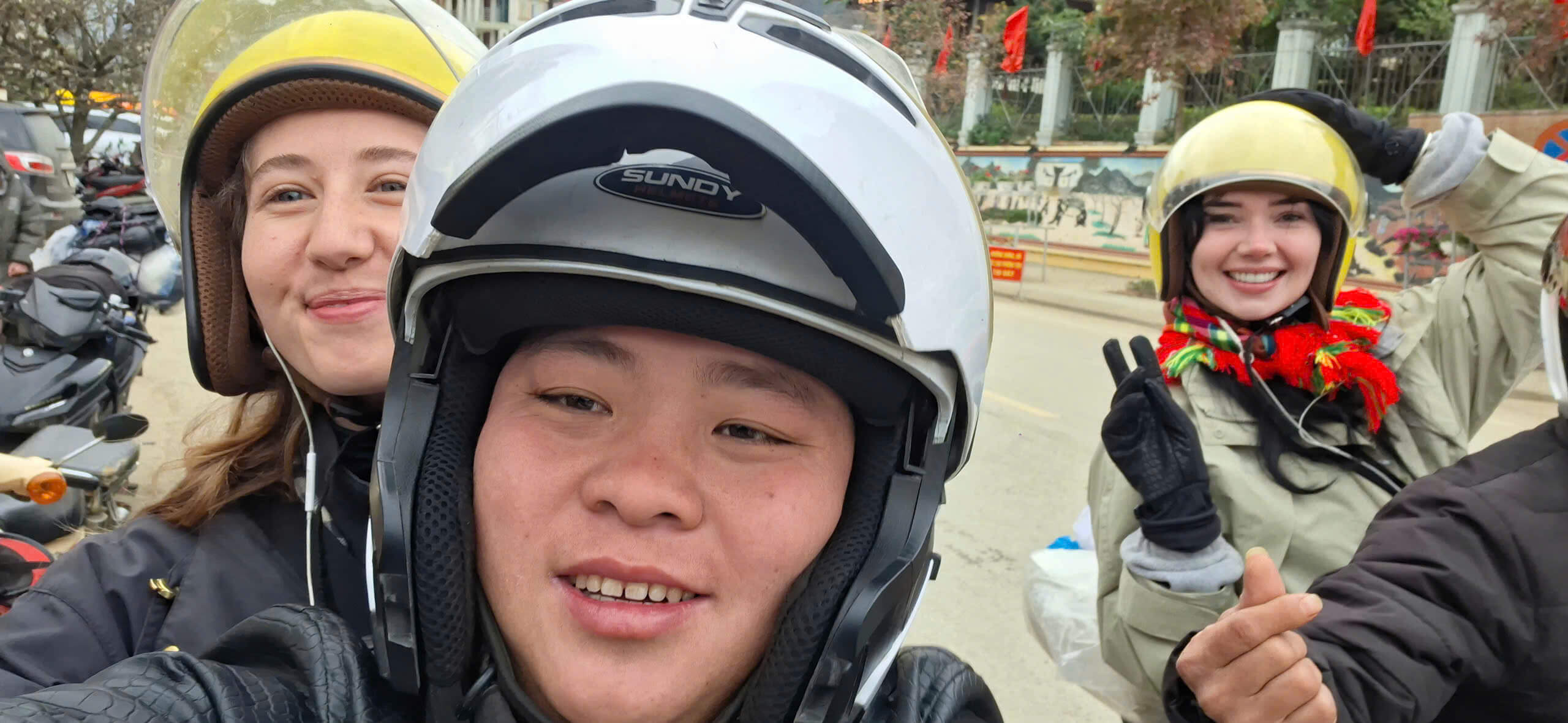 Safe Ha Giang Loop motorbike tour with an experienced HGM Easy Rider guide and tourists